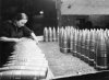 1941fa MVA wmn inspects shells Wgn38.jpg